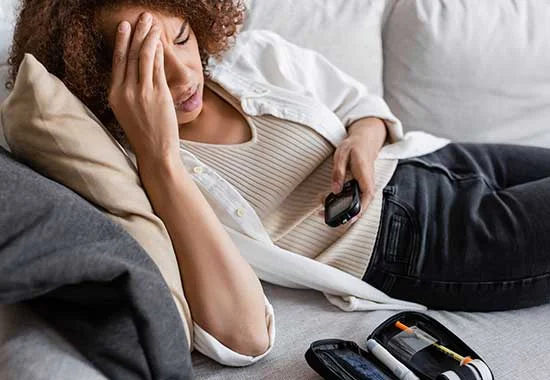 Woman experiencing diabetes complications